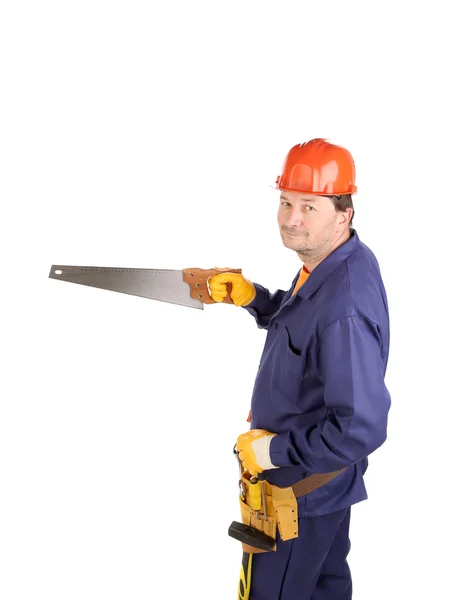 Worker in hard hat holding saw — Stock Photo, Image