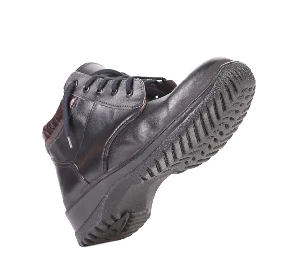 Black man's boot. — Stock Photo, Image