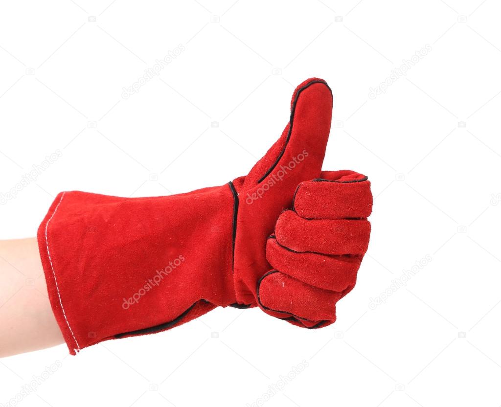 Hand shows thumb up in glove.