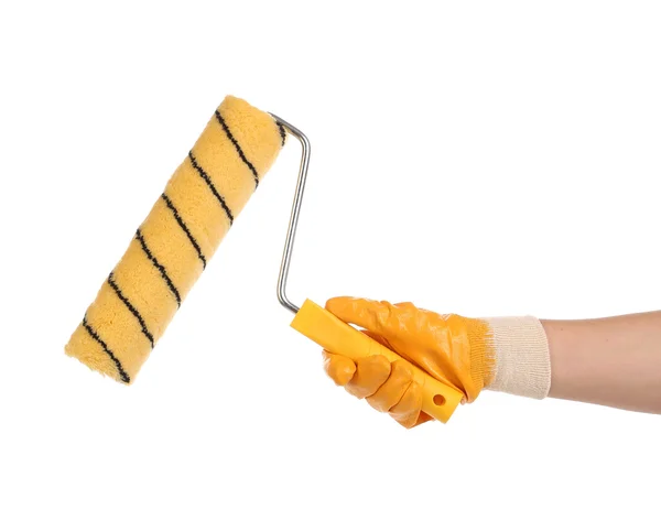 Hand with paintbrush roller. — Stock Photo, Image