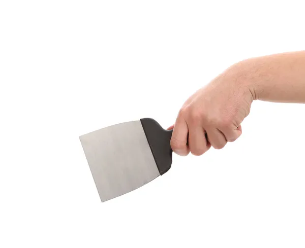 Hand holds construction spatula. — Stock Photo, Image