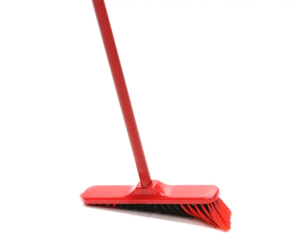 Close up of red black broom. — Stock Photo, Image