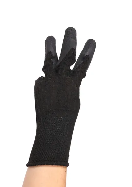 Hand in gloves shows three. — Stock Photo, Image