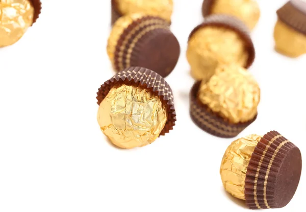 Un mucchio di bonbon d'oro al cioccolato . — Foto Stock