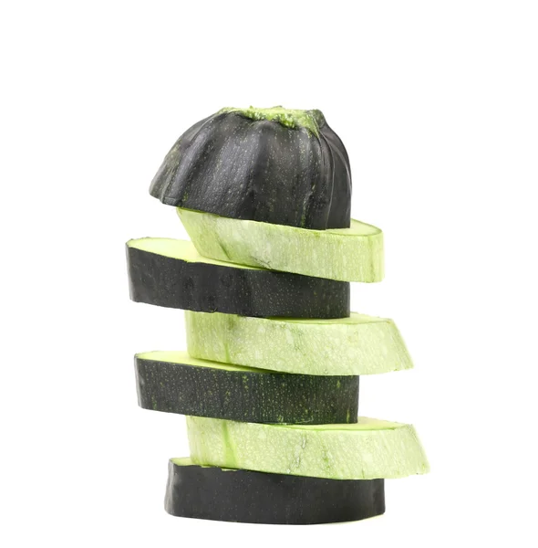 Groene en witte plakjes courgette. — Stockfoto