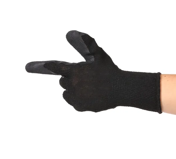 Black rubber glove on hand as gun. — Stock Photo, Image