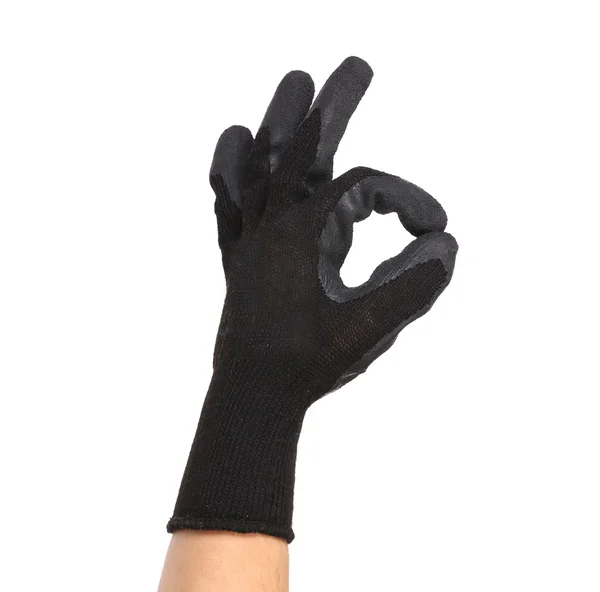 Black rubber protective glove shows sign ok. — Stock Photo, Image