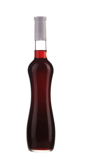 Láhev plná červená vína. — Stock fotografie