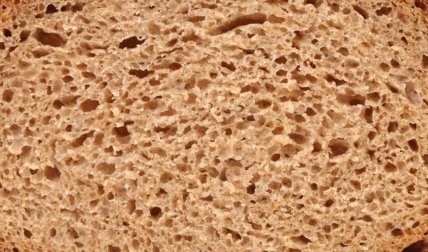 Kahverengi ekmek dilimi. yakın çekim — Stok fotoğraf
