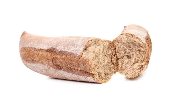 Broken long brown loaf — Stock Photo, Image