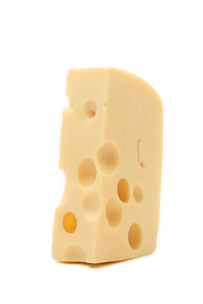 Stukje gele Nederlandse kaas. — Stockfoto