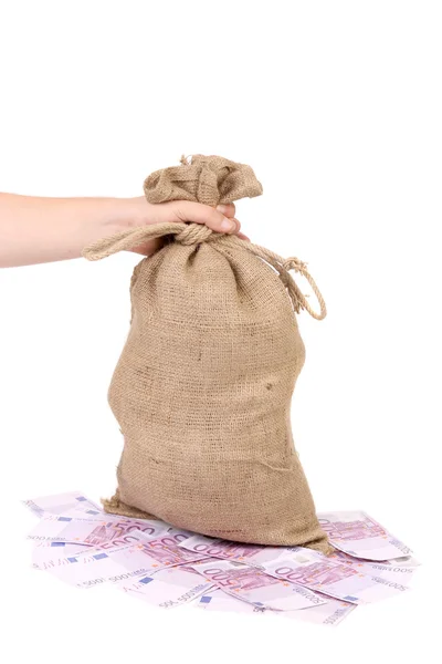 Hand holds bag with money. — Stock Photo, Image