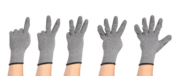 Hands in gloves show figures — Stock Photo, Image