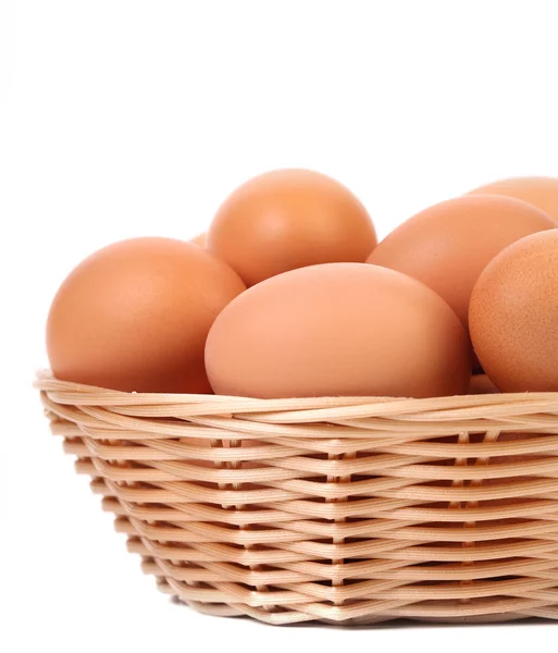 Eggs in the wicker basket — Stock Photo, Image