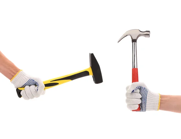 Hands with protection gloves holding hammers — Stock Photo, Image
