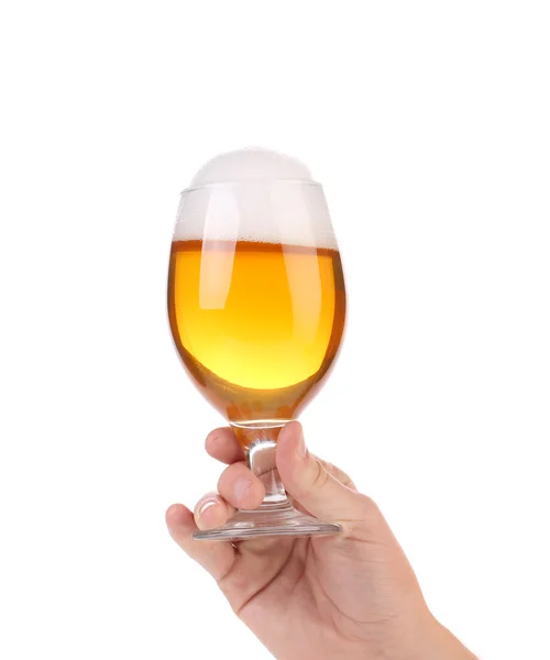 Full beer glass in hand. — Stock Photo, Image