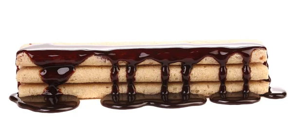 Flux de ciocolată pe sticle de biscuiți . — Fotografie, imagine de stoc