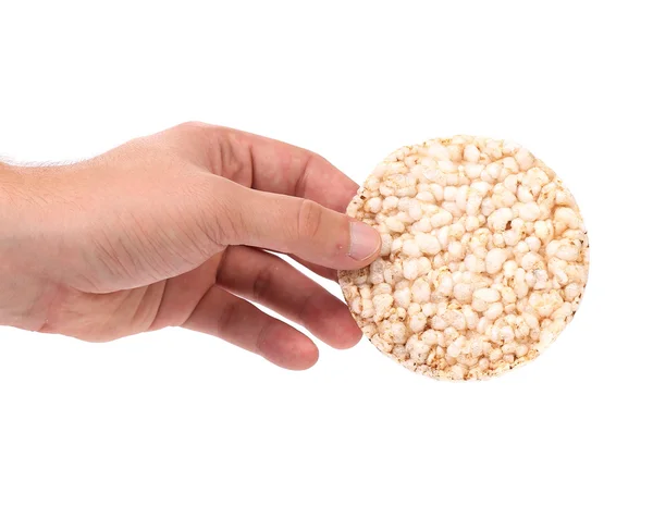 Puffed rice snack in hand. — Stock Photo, Image