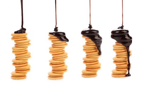 Chocolate dripping on cookies. — Stock Photo, Image