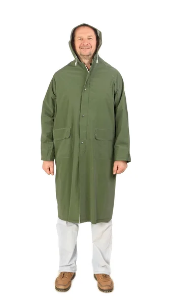 Man in green long coat. — Stock Photo, Image