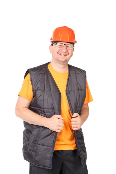 Happy worker in vest and hard hat. — Stock Photo, Image