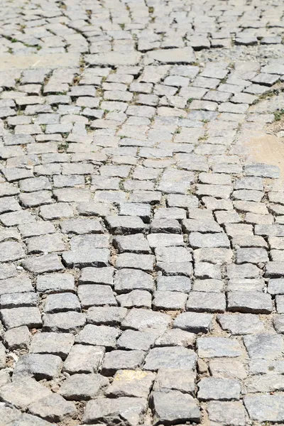 Textura da estrada de pedra. Cobblestones . — Fotografia de Stock