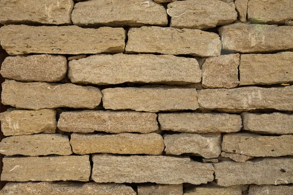 Hnědá kamenná zeď. — Stock fotografie