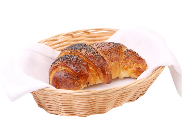 Image of croissant with poppy in a basket. — Stock Photo, Image