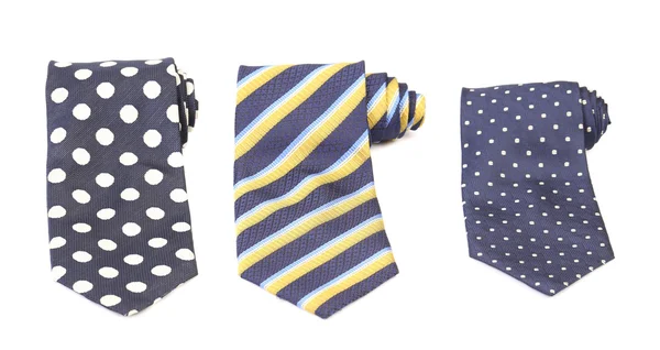 Three rolled multi-colored tie. — Stock Photo, Image