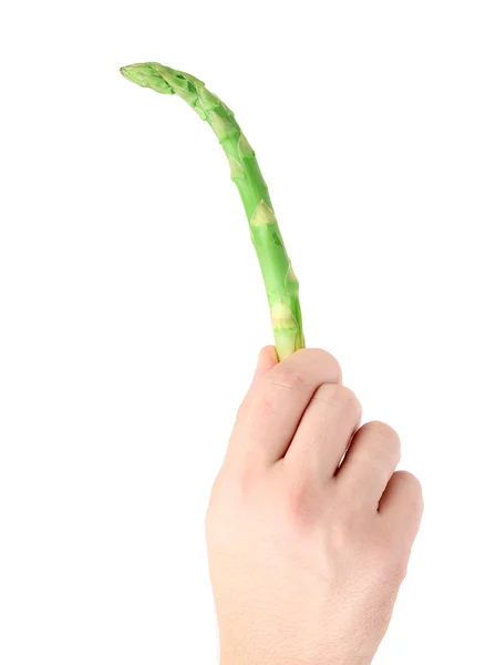 Mão segura o espargos verdes frescos . — Fotografia de Stock
