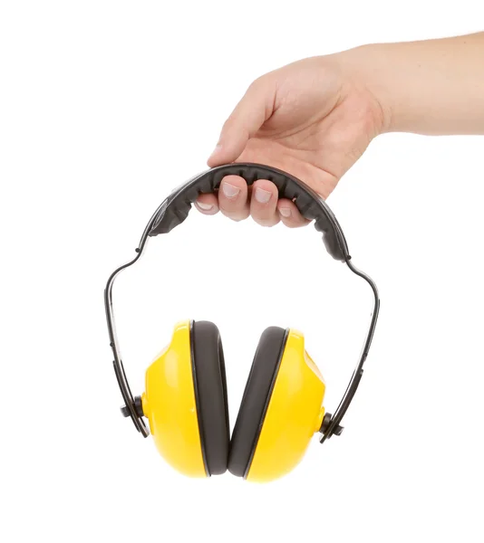 Manos sostiene auriculares protectores de trabajo . — Foto de Stock