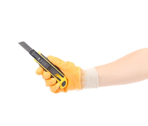 Hand in gloves holding knife. — Stock Photo, Image