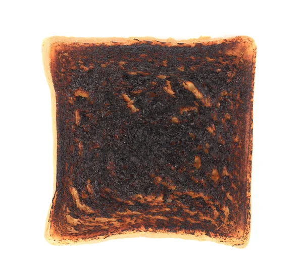 Крупним планом шматочок спалений тост . — стокове фото