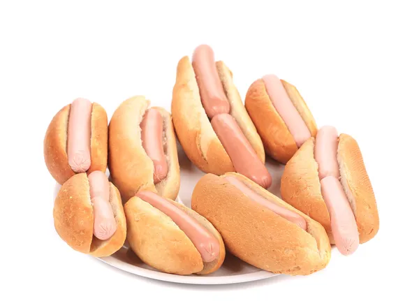 Un mucchio di hot dog sul piatto . — Foto Stock