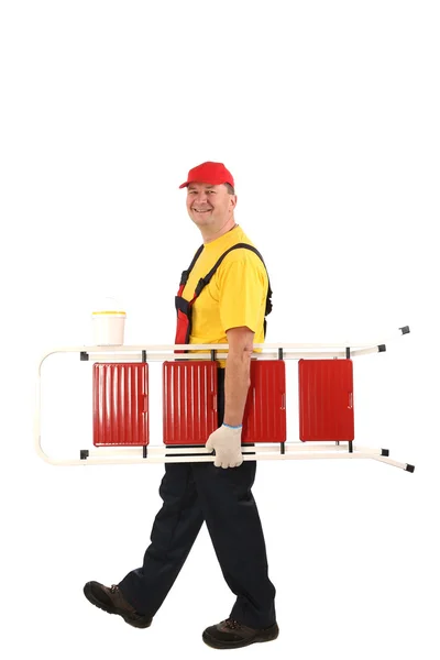 Worker with ladder smiling — Stock Photo, Image