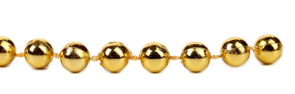 Decorative golden beads. — Stock Photo, Image