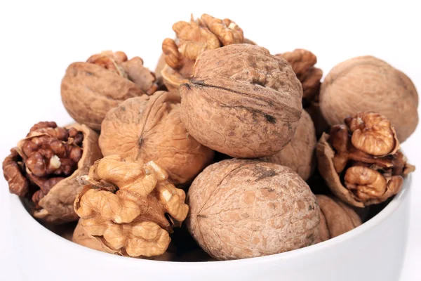 Bowl full with walnuts. Close up. — Stock Photo, Image