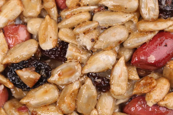 Close up of candied seeds and nuts. — Stock Photo, Image