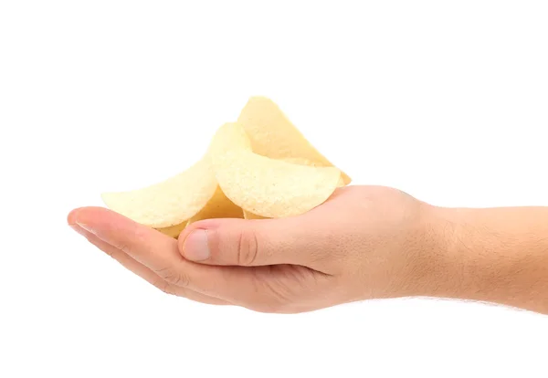 Patates cipsi elini tutar. — Stok fotoğraf