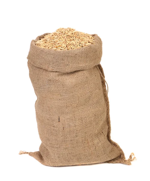 Wheat grains in the bag. — Stock Photo, Image