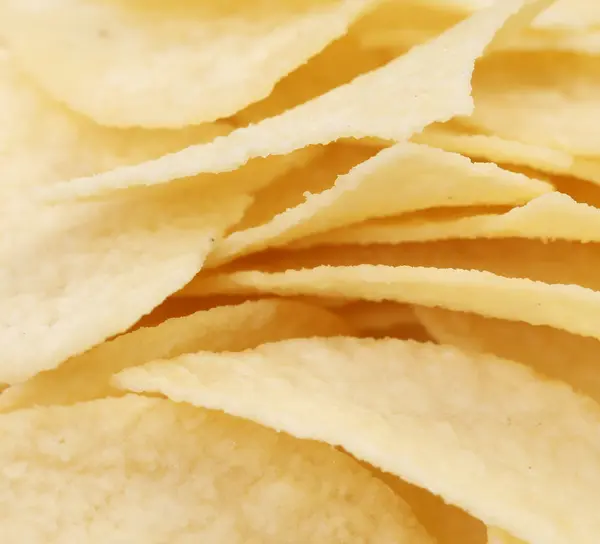 Hintergrund der Kartoffelchips. — Stockfoto