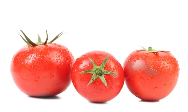 Tres tomates rojos maduros . —  Fotos de Stock