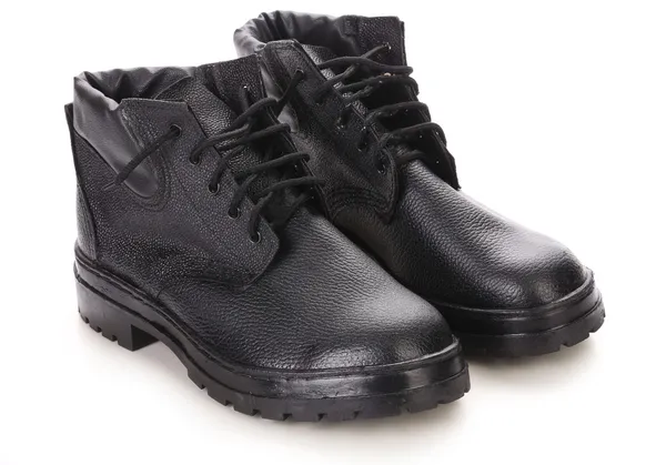 Paar zwart lederen laarzen. — Stockfoto