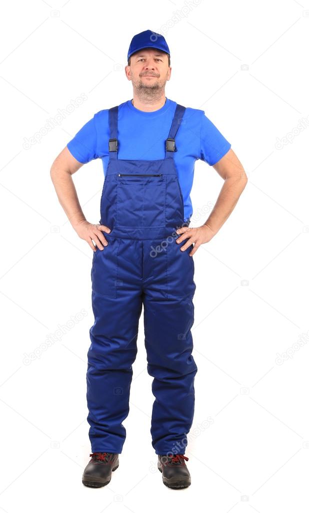 Worker in blue overalls.