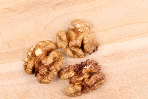 Close up of three walnut kendels. — Stock Photo, Image