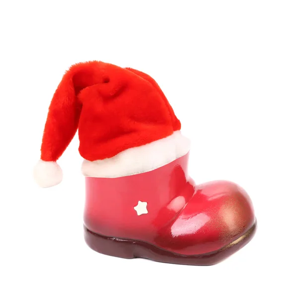 Santa's hat on xmas boot. — Stock Photo, Image