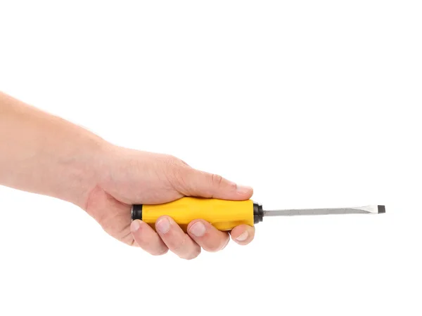 Screwdriver with yellow handle in hands. — Stock Photo, Image