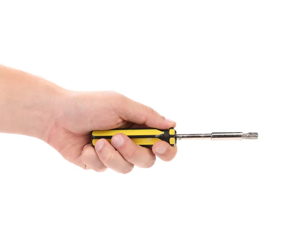 Screwdriver with yellow handle in hands. — Stock Photo, Image