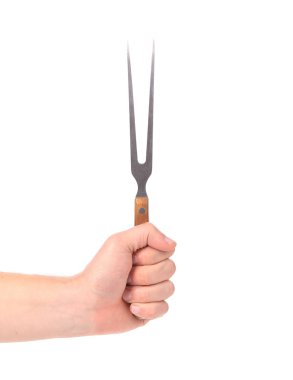 Close up of cheese fork in hand.
