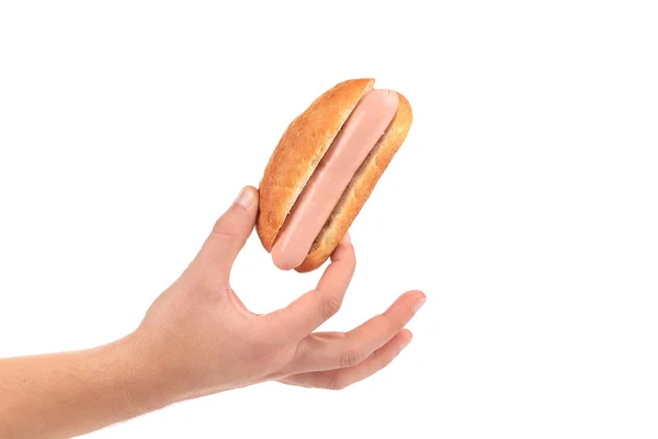 Hand hålla hotdog. — Stockfoto